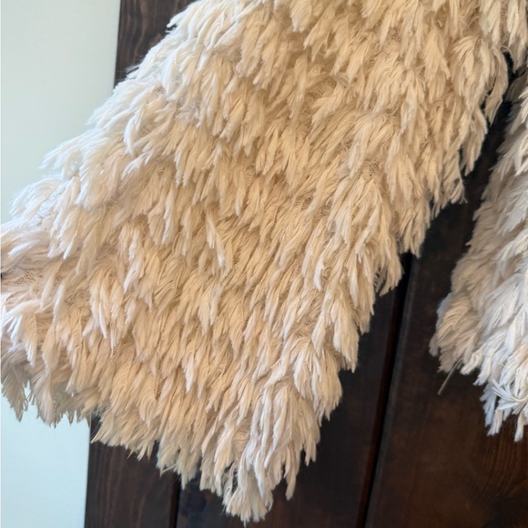 Love Richie Sweater has a shaggy or fuzzy texture and is a cream color. Size M - Picture 7 of 9